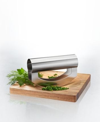 Cutting board with cradle knife