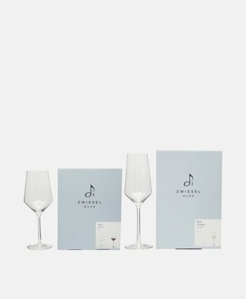 Set of champagne glasses and wine cooler